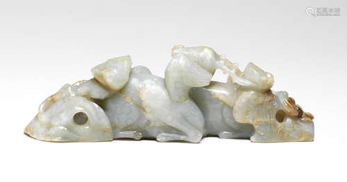 A PALE GREEN JADE 'DOUBLE DEER' BRUSHREST Ming Dynasty