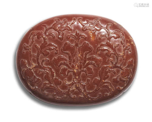 A CARVED AMBER 'LOTUS' PLAQUE Ming Dynasty
