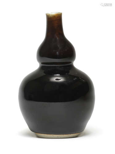 A SMALL MIRROR-BLACK-GLAZED DOUBLE-GOURD VASE Kangxi