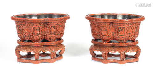 A RARE PAIR OF CARVED THREE-COLOUR LACQUER RUYI-SHAPED JARDI...