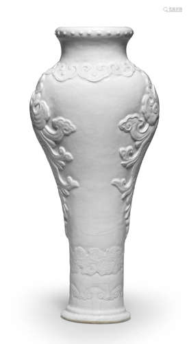 A RARE WHITE-GLAZED SOFT-PASTE SLENDER BALUSTER MOULDED VASE...