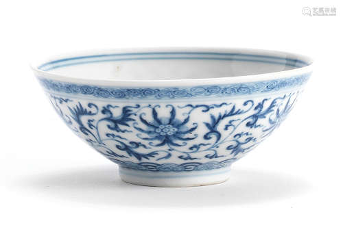A BLUE AND WHITE 'LOTUS-SCROLL' BOWL Qianlong seal mark and ...
