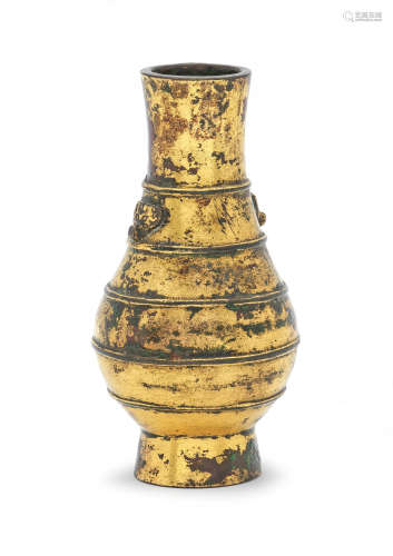 A RARE SMALL GILT-BRONZE VASE, HU Ming Dynasty or earlier