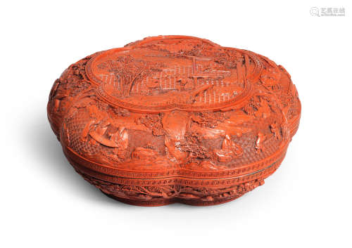 A CARVED CINNABAR LACQUER PRUNUS-FORM BOX AND COVER Qianlong