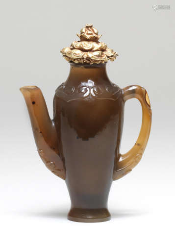 AN EXCEPTIONALLY RARE AGATE EWER WITH GOLD-MOUNTED COVER 15t...