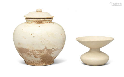 A CREAM-GLAZED ZHADOU AND A CREAM-GLAZED JAR AND COVER Tang ...