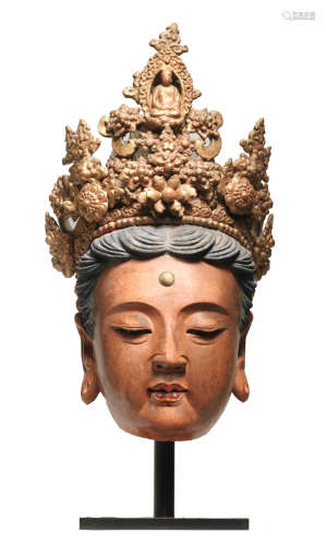 A VERY RARE MASSIVE PAINTED STUCCO HEAD OF GUANYIN Yuan/earl...