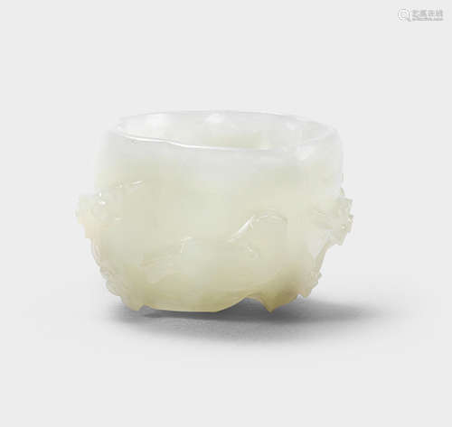 A FINE SMALL WHITE JADE 'PRUNUS' CUP 17th/18th century