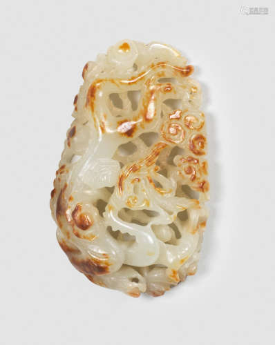 A RARE WHITE AND RUSSET JADE OPENWORK 'DRAGON' PLAQUE Probab...