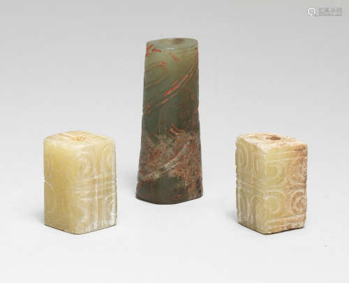 AN ARCHAIC JADE BEAD AND TWO HARDSTONE BEADS Zhou Dynasty