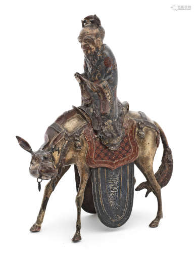 A PAINTED BRONZE 'ZHANG GUOLAO ON MULE' INCENSE BURNER AND C...
