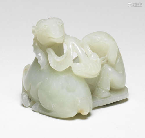 A PALE GREEN JADE 'DOUBLE RAM' GROUP 17th/18th century