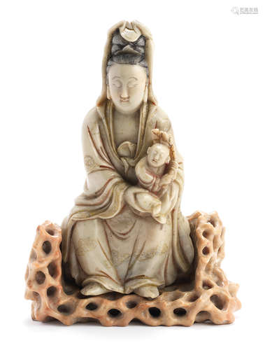 A SOAPSTONE FIGURE OF GUANYIN AND CHILD Kangxi