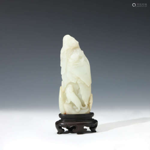 A Carved White Jade Dragon And Tiger Boulder