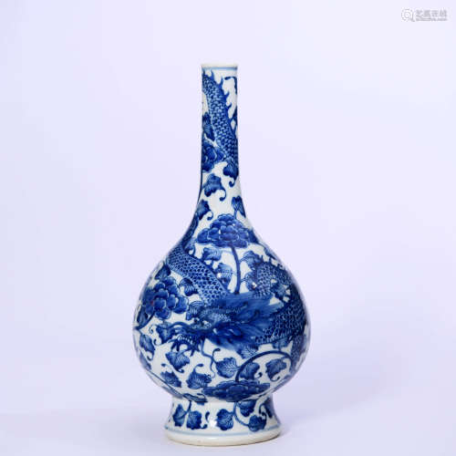 A Blue And White Interlocking Flower And Dragon Bottle Vase