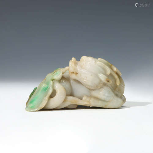 A Carved Jadeite Auspicious Beast Ornament