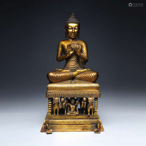 A Gilt-Bronze Statue Of Sakyamuni