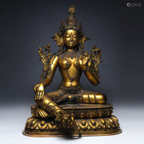 A Gilt-Bronze Statue Of Green Tara