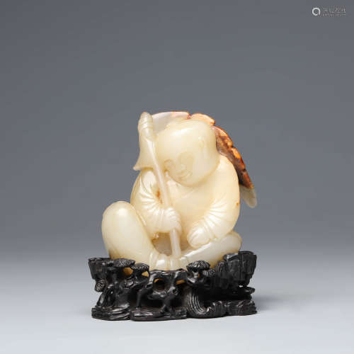 A Carved White Jade Figure Ornament