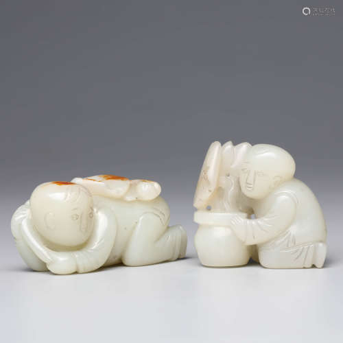 A Set Of Two Carved White Jade Children Ornaments