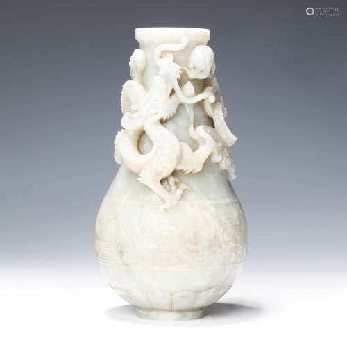 A Carved White Jade Dragon Bottle Vase