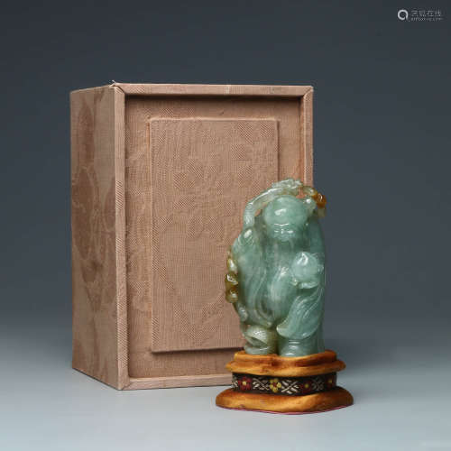 A Carved Jadeite Figure Of Immortal Ornament