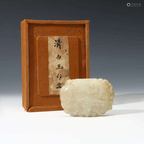 A Carved White Jade Elephant Box And Cover