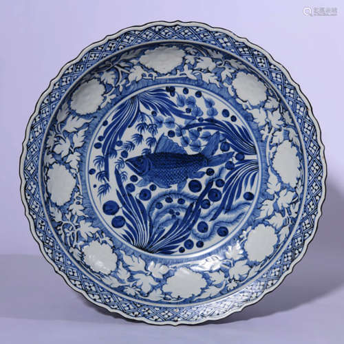 A Blue And White Fish And Algae Dish