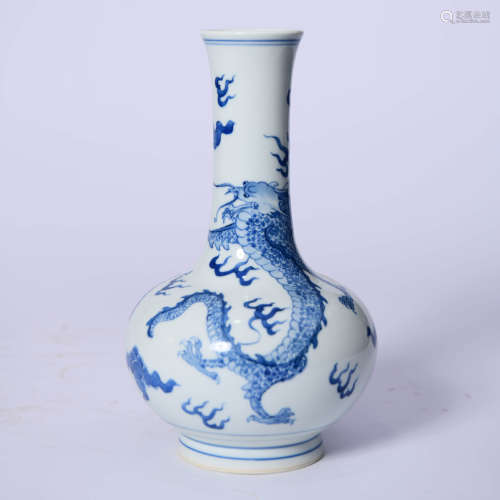 A Blue And White Dragon And Cloud Bottle Vase