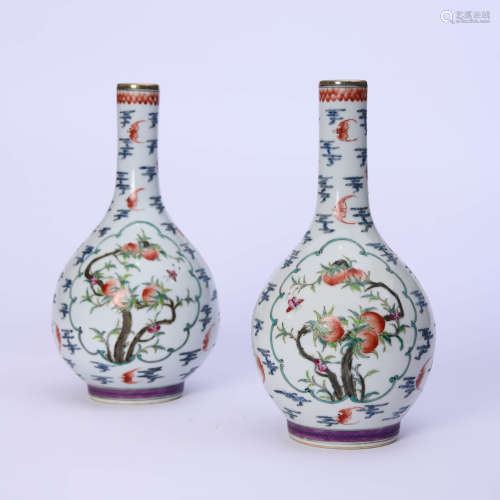 A Pair Of Famille Rose Floral Bottle Vases