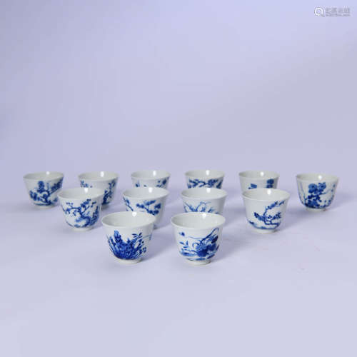 A Set Of Twelve Blue And White Floral Cups