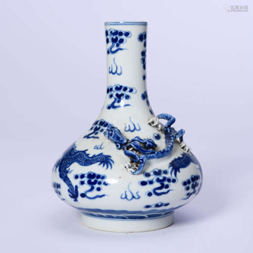 A Blue And White Dragon And Cloud Bottle Vase