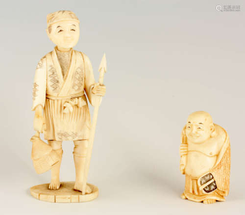 A CHINESE CARVED IVORY STANDING MALE FIGURE carrying a baske...