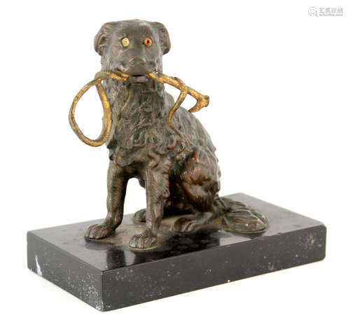 A 19TH CENTURY NOVELTY BRONZE INKWELL modelled as a seated d...