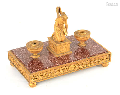 A 19TH CENTURY FRENCH ORMOLU AND PORPHYRY MARBLE ENCRIER hav...