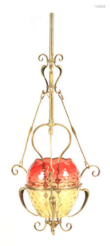 AN ART NOUVEAU BRASS FRAMED HANGING GAS LIGHT with turned st...