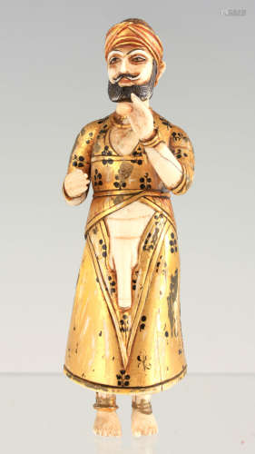 A RARE 19TH CENTURY INDIAN CARVED IVORY AND GILDED FIGURE 14...