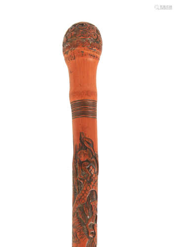 AN EARLY 20TH CENTURY CHINESE CARVED BAMBOO WALKING STICK de...