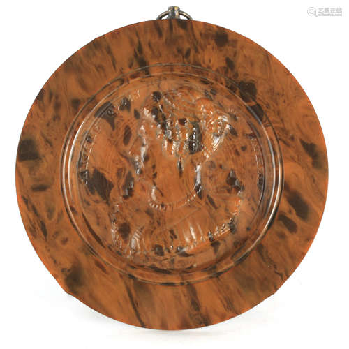 A FAUX TORTOISESHELL PLAQUE DEPICTING A PORTRAIT OF QUEEN CA...