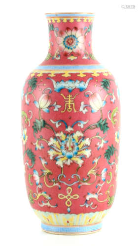 A CHINESE FAMILLE ROSE SLENDER OVOID SHOULDERED VASE with de...