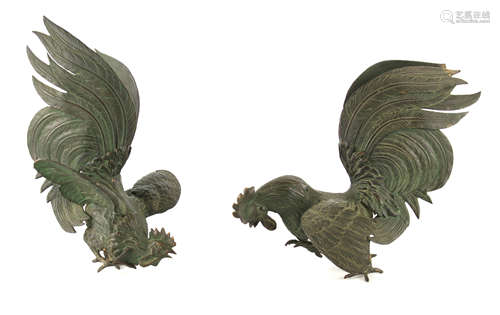 A PAIR OF 19TH CENTURY PATINATED BRONZE COCKERALS 26cm high