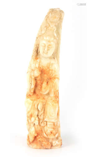 AN EARLY 20TH CENTURY WHITE JADE FIGURINE MODELLED AS A GEIS...