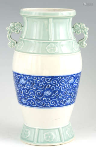 AN UNUSUAL 19TH CENTURY CHINESE CELADON VASE with blue and w...