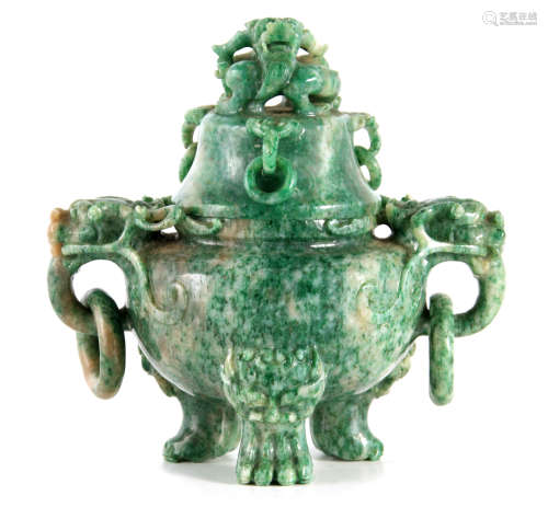 A CHINESE MOTTLED JADE KORO AND COVER surmounted by an entwi...