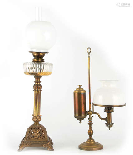 A VICTORIAN ORNATE CAST BRASS OIL LAMP with square footed pi...