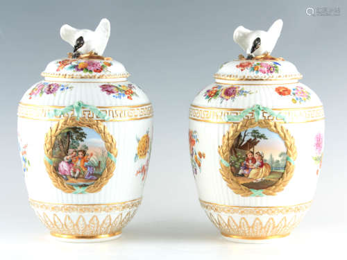 A FINE PAIR OF LATE 19TH CENTURY BERLIN PORCELAIN JARS AND C...