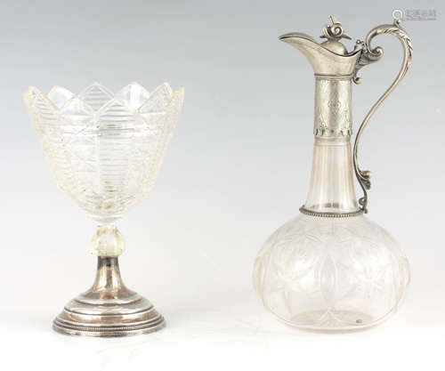 A 19TH CENTURY ENGRAVED BULBOUS GLASS CLARET JUG with slende...