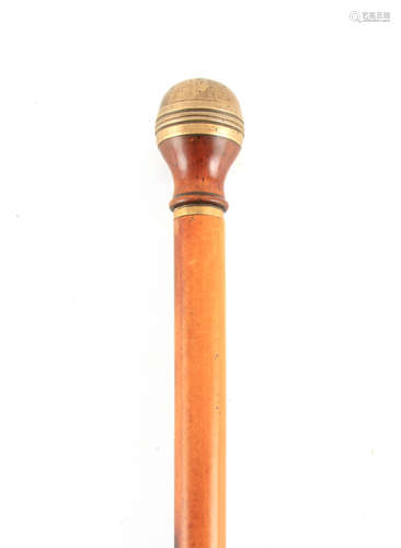 A 19TH CENTURY MALACCA CANE WALKING STICK WITH FITTED COMPAS...