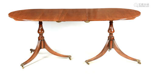 A REGENCY STYLE MAHOGANY TWIN PEDESTAL D END DINING TABLE th...