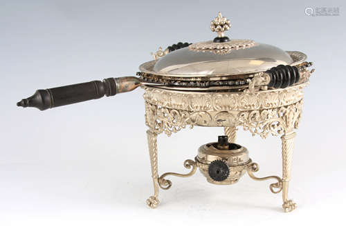 AN ELABORATE 19TH CENTURY CAST SILVER PLATE TWO HANDLED WARM...